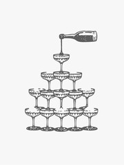 New year party arrangement with glasses and drinks. Tower made of glasses with champagne on white background