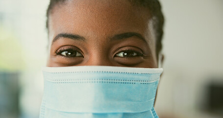 Portrait, doctor and mask with closeup for covid, virus or disease for protection in hospital. Black woman, face or happy emoji by career, choice or occupation in healthcare, medicine and science