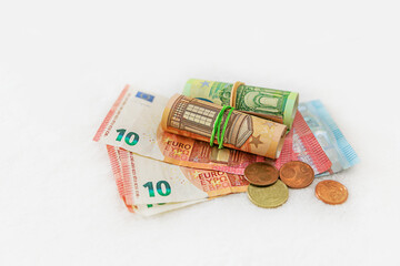 Euro Money and Euro Cents on White Background with copy space.