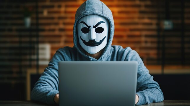 Masked hacker engaged in cyber crime close-up of a digital threat in a dark home office