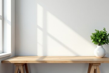 Modern minimalist wooden desk, empty white wall, overhead, bright