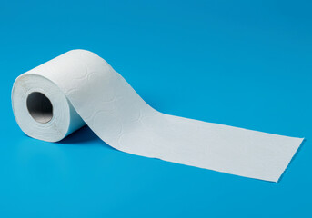 A single roll of toilet paper unrolled on a blue background