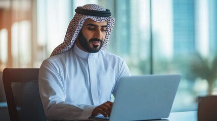 Confident smart mature Arabian middle eastern president of company working on laptop .Focused financier accountant on paper work inside office, mature man using computer for summarizing accounts.
