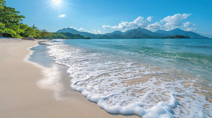 serene beach scene with crystal clear water and gentle waves lapping at shore, surrounded by lush greenery and mountains in background
