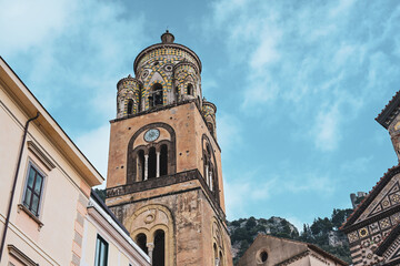 The Amalfi Cathedral bell tower in Amalfi, Italy. The church of the Apostle Saint Andrew, Roman Catholic church in the Piazza del Duomo at sunset