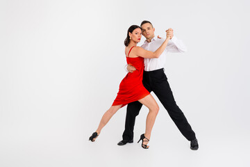 Full length photo of tempting married couple dressed classic clothes enjoying bachata dance empty...