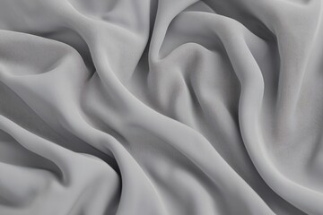 Obraz premium Draped Gray Fabric Showing Soft Texture and Flow