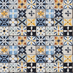 Motif répétitif de carreaux de ciment vintage avec motifs variés floraux et géométriques en bleu, jaune, noir et blanc, style méditerranéen