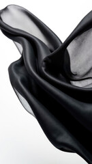 Elegant black silk fabric gracefully draped and fluttering on white background, soft waves. Vertical futage for promotions, discount offers, social media and sales