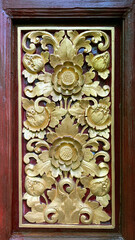 Close up of carved wood with ethnic ornamental decoration and engravings, random carving engraved...