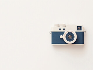 Fototapeta premium A blue and white camera with a white background