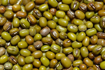 Detail of a surface covered with dry uncooked mung beans