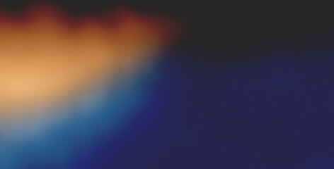 Obraz premium Soft abstract background with blurred orange and blue hues blending together, creating a smooth and calming effect