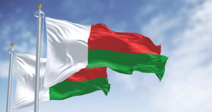 National flags of Madagascar waving in the wind on a clear day