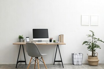 Simple home office setup in front of a plain white wall, quiet atmosphere, simple decor