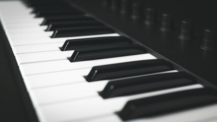 A midi keyboard close-up, piano keys, copy space.