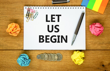 Let us begin symbol. Concept words Let us begin on beautiful white note. Beautiful wooden...