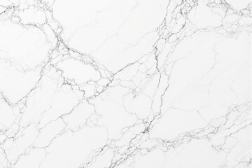 Fototapeta premium White marble texture with natural veins on a light background.