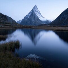 Twilight reflection of mountains in a serene lake panoramic view nature landscape tranquil environment