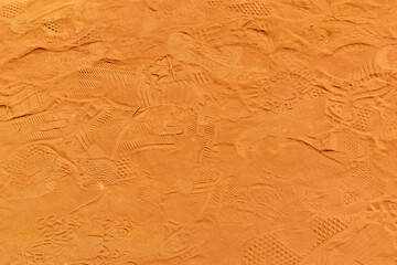 Yellow-orange background. Rousillon, Provence, Alps, Cote d'Azur. Earth with ocher mineral.