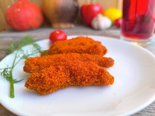 Chicken nuggets on a plate. High-quality photo