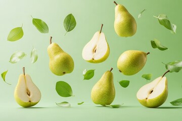 Obraz premium Fresh green pears and leaves floating against a soft green backdrop in a creative arrangement