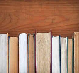 Old books on shelf. Ancient background