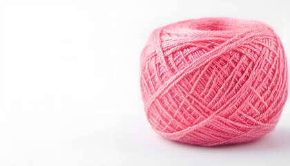 Bright pink embroidery thread on white background