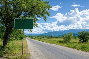 Empty Road Sign near Scenic Landscape with Blue Sky and Mountains