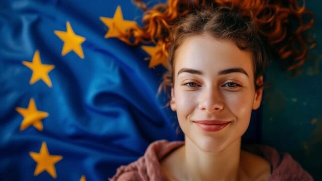 Young woman with the EU flag in the background. Concept of Schengen visa and studying in the European Union.