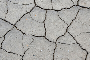 Obraz premium Cracked concrete surface material urban environment close-up view structural integrity concept