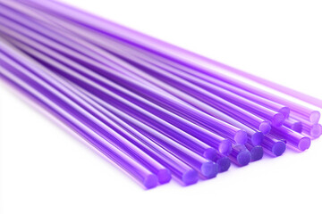 Bundle of Purple Glass Rods on White Background