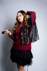 BLONDE SINGER WITH MICROPHONE