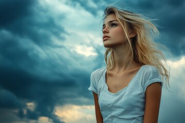 Young Woman Under Stormy Sky