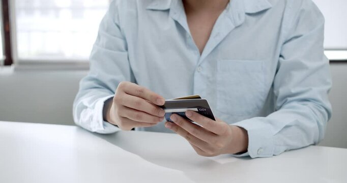 Close-up shot of a woman browsing and choosing a credit for a transaction.