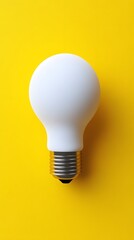 White Light Bulb on Yellow Background Idea Concept