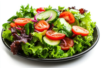 Appetizing summer salad with tomatoes, lettuce, red cabbage, onions and cucumbers, healthy summer breakfast in a black plate, on a white background, healthy food concept