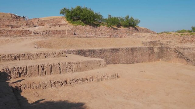 Wide angle shot of ancient water reservoir of the Harappan civilization at Dholavira in Kutch, Gujarat, India. UNESCO world heritage site at Kutch. Ancient civilization background with copy space.