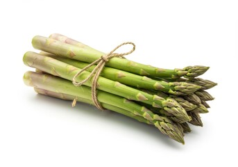 A bundle of fresh green asparagus tied with a rustic string isolated on a white background