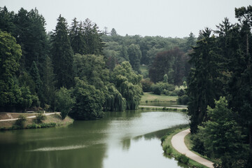 a lake in the middle of a beautiful park