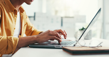 Typing, laptop and hands of businessman in office for online planning, writing proposal and research. Creative, professional and worker on computer for project, website reviewer and internet feedback