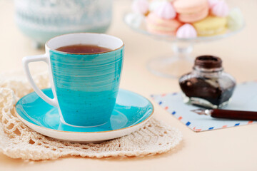 A blue cup on the table.
