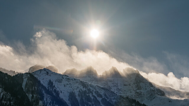 Winter sun over Les Dents du Midi in the Swiss Alps