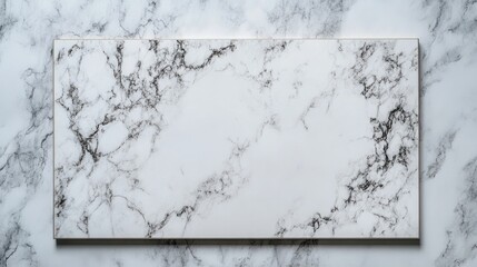 A blank canvas resting on a white marble surface, photographed from above, leaving room for design customization
