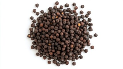 A heap of ripe black mulberries displayed against a white background from a top-down perspective