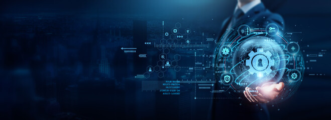 Businessman holding access management tools, ensuring secure user authentication and controlling...