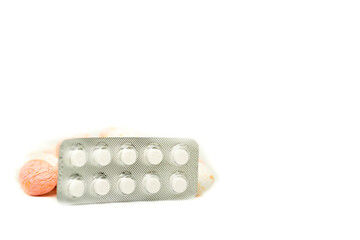 Pills blister on white.Medicine. Medications in tablets, blisters, capsules