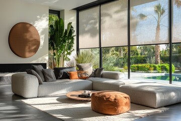 Motorized roller shades in a modern living room, featuring automated controls and summer-ready decor