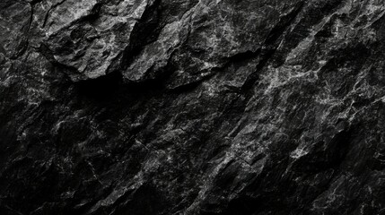 Black or dark gray rough grainy stone texture background