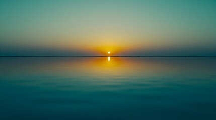 This landscape photo captures a tranquil sunset and is characterized by its minimalistic, peaceful and expansive landscape.